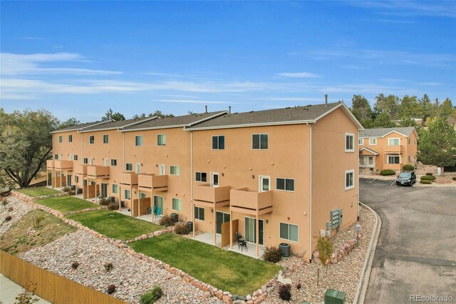 2220 E Ln Salle St Unit 108, Colorado Springs, CO 80909 - view of building exterior with central AC