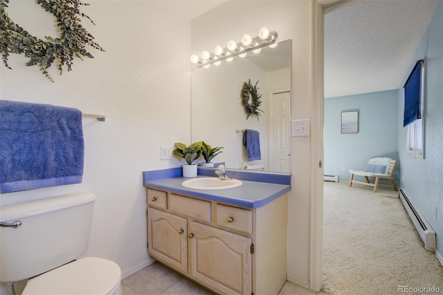 bathroom featuring toilet, a baseboard radiator, a textured ceiling, vanity, and a baseboard heating unit