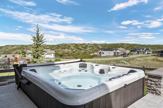 2144 Bellcove Dr, Castle Pines, CO 80108 - view of patio with a hot tub