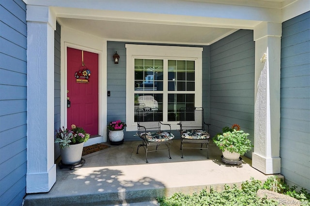 2169 Fox Fire St, Highlands Ranch, CO 80129 - view of exterior entry with a porch
