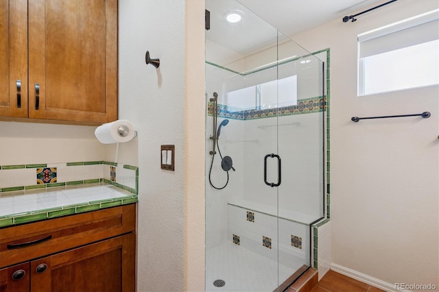 2169 Fox Fire St, Highlands Ranch, CO 80129 - bathroom with a shower stall and baseboards