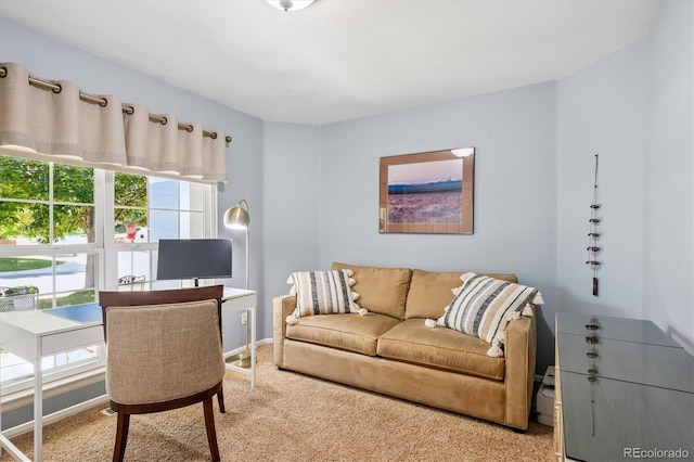 2169 Fox Fire St, Highlands Ranch, CO 80129 - carpeted living room featuring a desk and baseboards