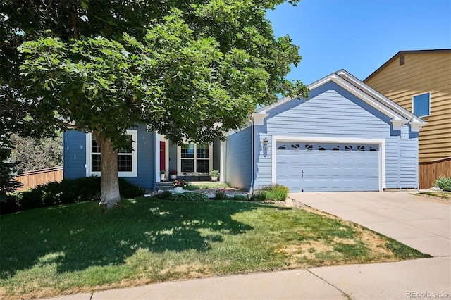 2169 Fox Fire St, Highlands Ranch, CO 80129 - view of front facade featuring driveway and an attached garage
