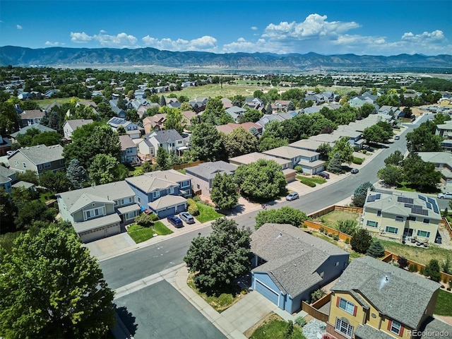 2169 Fox Fire St, Highlands Ranch, CO 80129 - aerial perspective of suburban area with a mountainous background