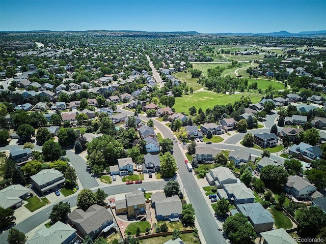 2169 Fox Fire St, Highlands Ranch, CO 80129 - aerial view of residential area featuring a mountain backdrop