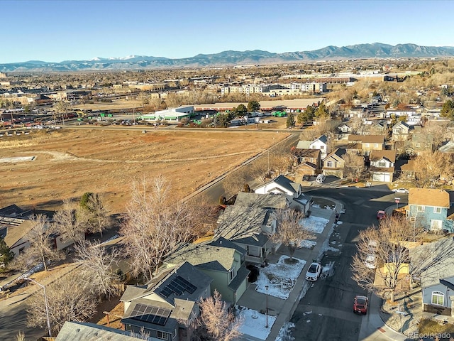 drone / aerial view featuring a mountain view