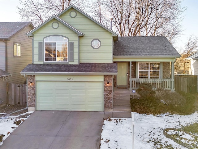 view of front of property with a garage