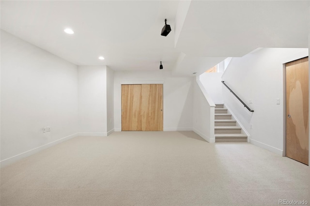 interior space with light colored carpet