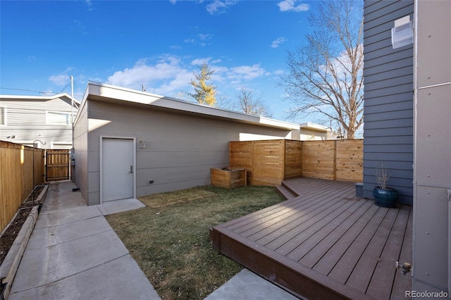 view of yard featuring a wooden deck