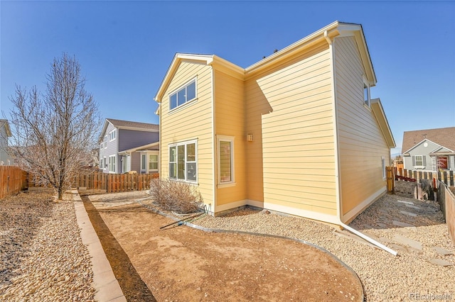 exterior space with a fenced backyard