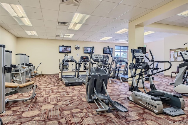 3184 S Heather Gardens Way Unit 302, Aurora, CO 80014 - gym featuring carpet floors and a drop ceiling