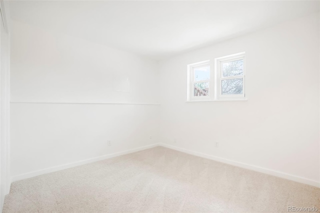 129 Gordon Pl, Castle Rock, CO 80104 - carpeted empty room with baseboards