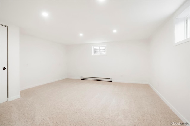 129 Gordon Pl, Castle Rock, CO 80104 - basement featuring baseboards, a baseboard radiator, light carpet, and recessed lighting