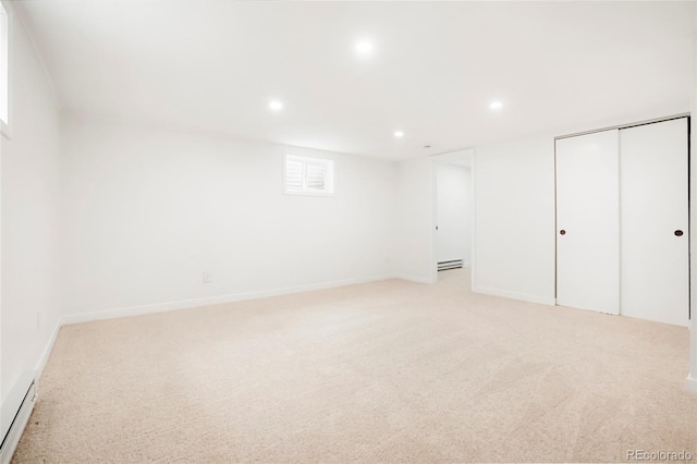 129 Gordon Pl, Castle Rock, CO 80104 - unfurnished bedroom with a baseboard radiator, light carpet, and recessed lighting