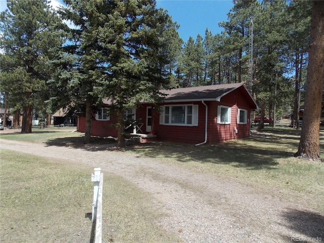 view of front of home with a front lawn