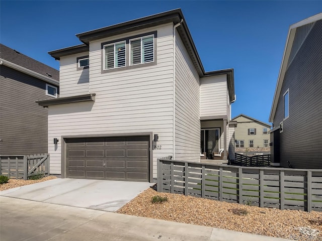 view of front of property with a garage