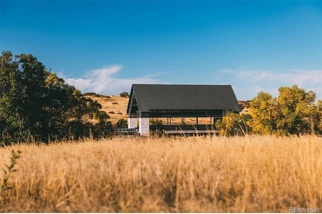 view of outdoor structure featuring a rural view