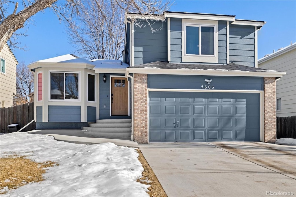 front of property featuring a garage