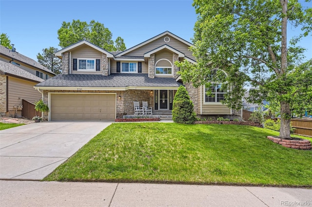 9743 Chanteclair Cir, Highlands Ranch, CO 80126 - view of front of house with an attached garage, driveway, and stone siding