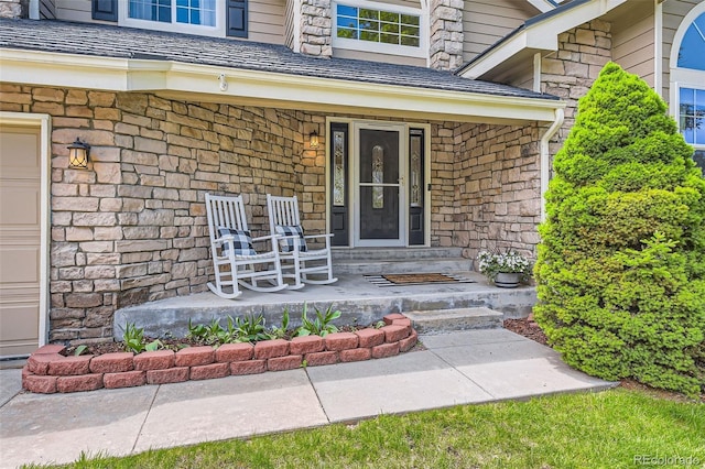 9743 Chanteclair Cir, Highlands Ranch, CO 80126 - property entrance with covered porch and stone siding
