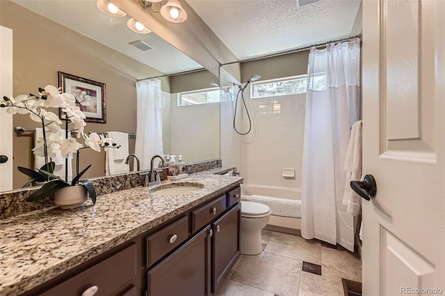 9743 Chanteclair Cir, Highlands Ranch, CO 80126 - full bath featuring toilet, vanity, shower / bath combo with shower curtain, and a textured ceiling