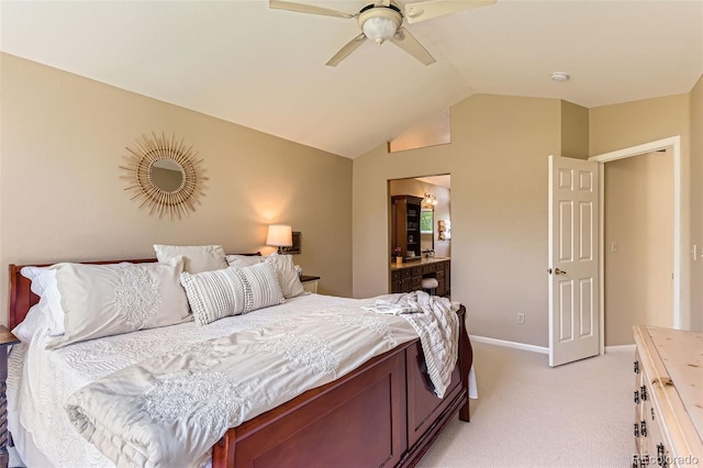 9743 Chanteclair Cir, Highlands Ranch, CO 80126 - bedroom featuring light carpet, vaulted ceiling, baseboards, ceiling fan, and ensuite bath