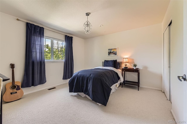 9743 Chanteclair Cir, Highlands Ranch, CO 80126 - bedroom with light colored carpet, baseboards, and a closet