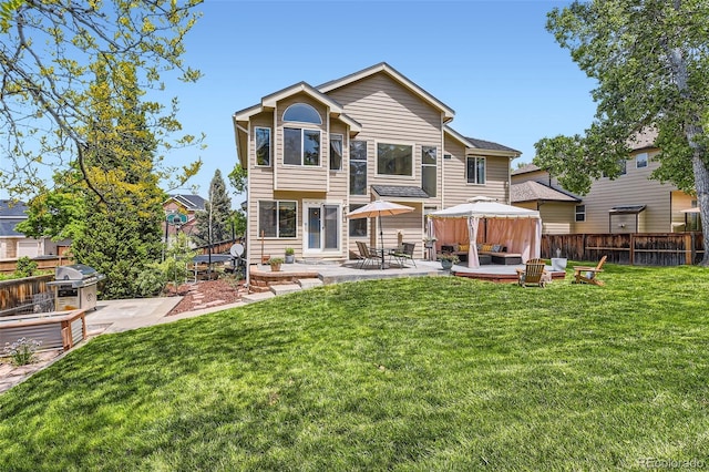 9743 Chanteclair Cir, Highlands Ranch, CO 80126 - back of property with a patio area and an outdoor living space