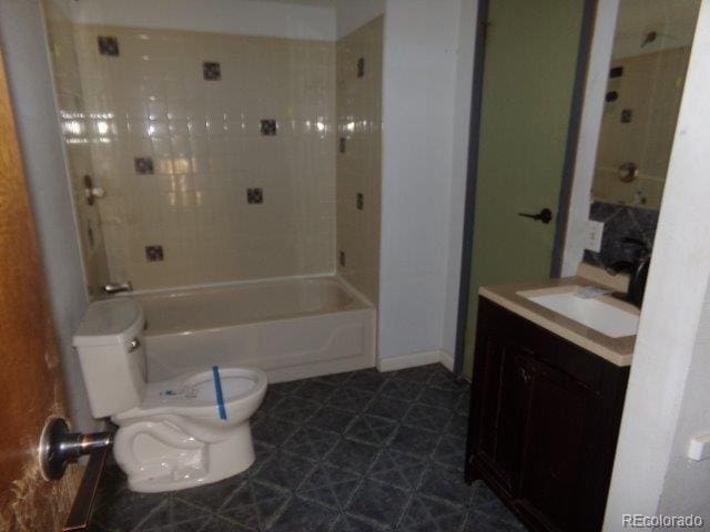 1889 S Flanders Way, Aurora, CO 80017 - bathroom featuring vanity and shower / washtub combination