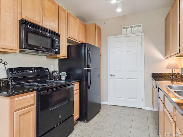 9142 Lodestar Ln Unit 305, Parker, CO 80134 - kitchen with black appliances, light brown cabinetry, and light tile patterned floors