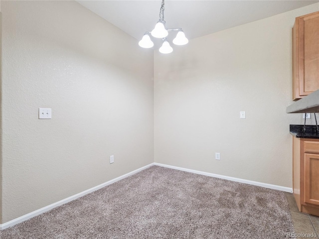 9142 Lodestar Ln Unit 305, Parker, CO 80134 - unfurnished dining area featuring a chandelier and light carpet