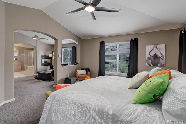 5830 Jasper Pointe Cir, Castle Pines, CO 80108 - bedroom with arched walkways, carpet, lofted ceiling, multiple windows, and a ceiling fan