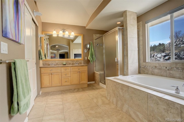 5830 Jasper Pointe Cir, Castle Pines, CO 80108 - full bathroom featuring a stall shower, double vanity, a bath, and tile patterned floors