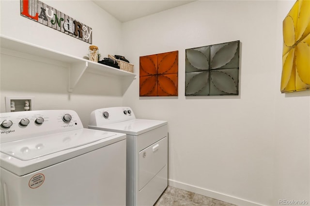 laundry area with independent washer and dryer