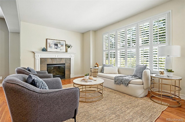 7527 E Severn Pl, Denver, CO 80230 - living room featuring wood finished floors and a fireplace
