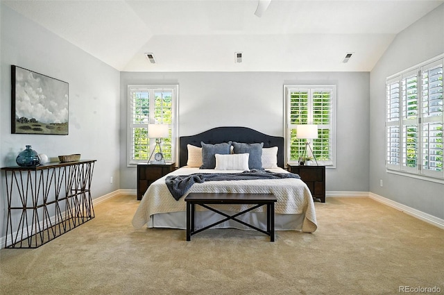 7527 E Severn Pl, Denver, CO 80230 - carpeted bedroom featuring vaulted ceiling, multiple windows, and ceiling fan