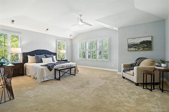 7527 E Severn Pl, Denver, CO 80230 - bedroom with lofted ceiling, multiple windows, carpet flooring, and a ceiling fan