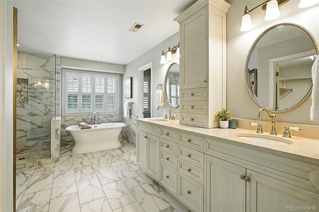 7527 E Severn Pl, Denver, CO 80230 - full bath with marble finish flooring, a marble finish shower, double vanity, a soaking tub, and recessed lighting