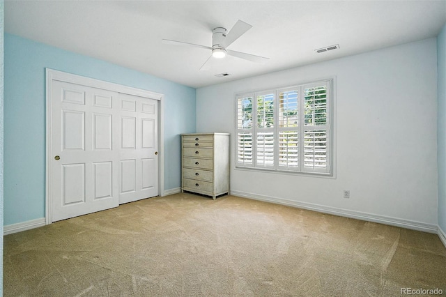 7527 E Severn Pl, Denver, CO 80230 - unfurnished bedroom featuring carpet, a ceiling fan, and a closet