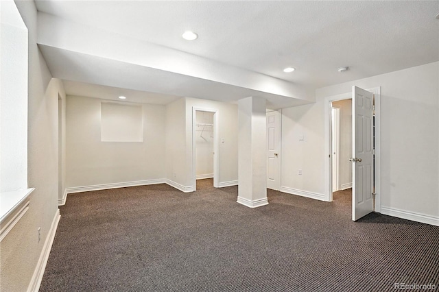 7527 E Severn Pl, Denver, CO 80230 - finished below grade area featuring dark carpet and recessed lighting