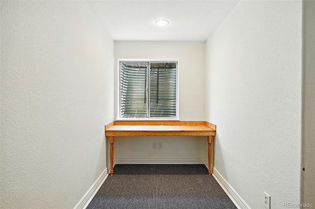 7527 E Severn Pl, Denver, CO 80230 - detailed view of carpet floors and a textured wall