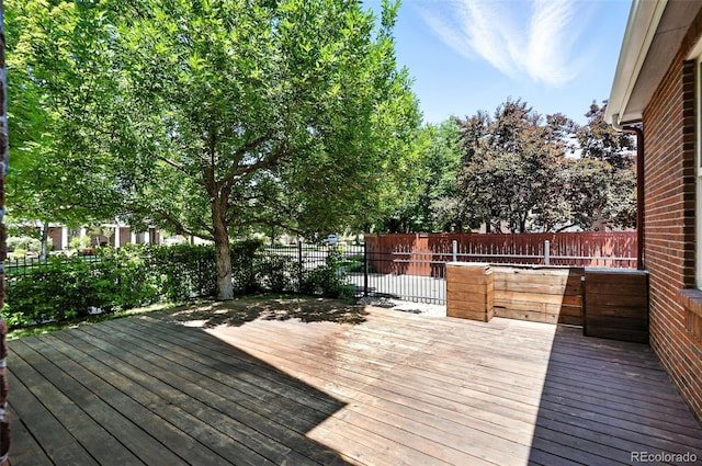 7527 E Severn Pl, Denver, CO 80230 - wooden deck featuring a fenced backyard