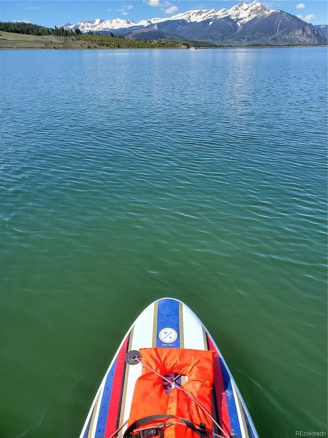 property view of water featuring a mountain view