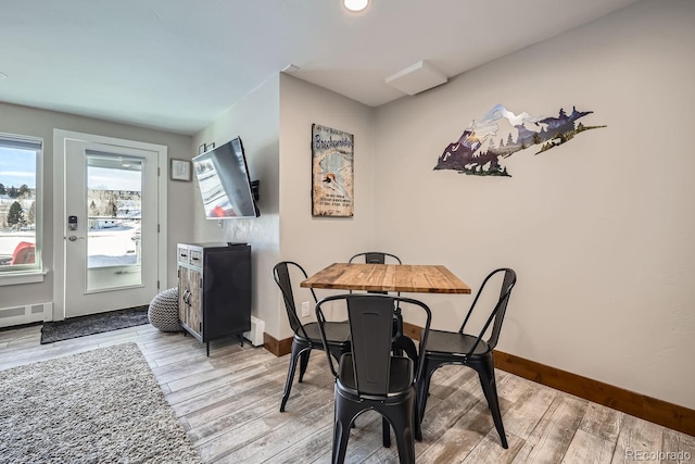 dining room featuring light wood-type flooring