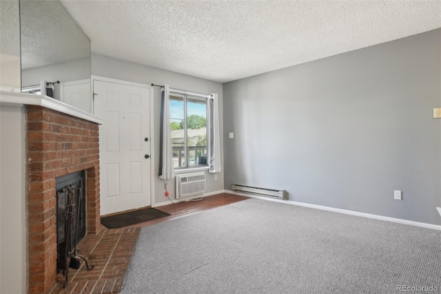 1118 City Park Ave Unit 226, Fort Collins, CO 80521 - unfurnished living room with baseboard heating, carpet flooring, a textured ceiling, a brick fireplace, and a wall mounted air conditioner