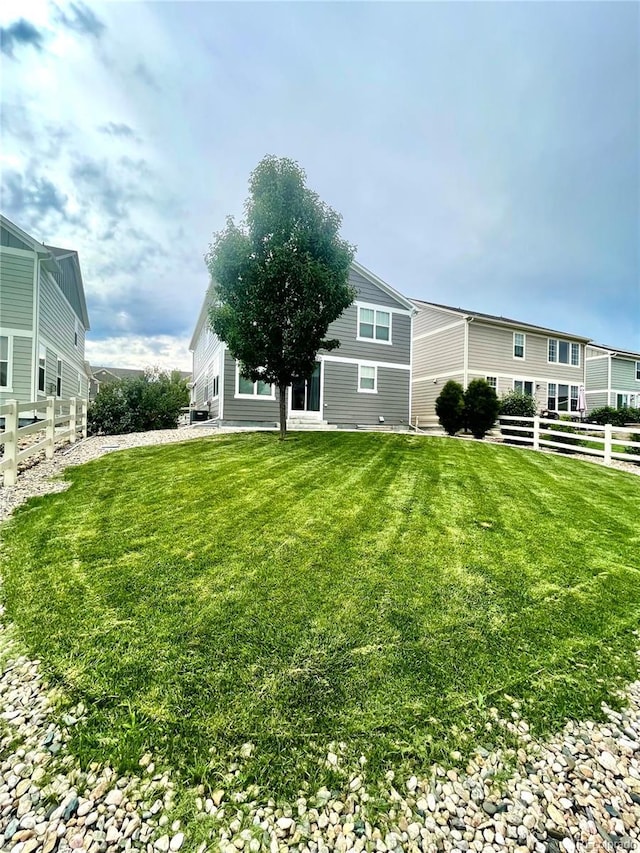 view of yard with fence