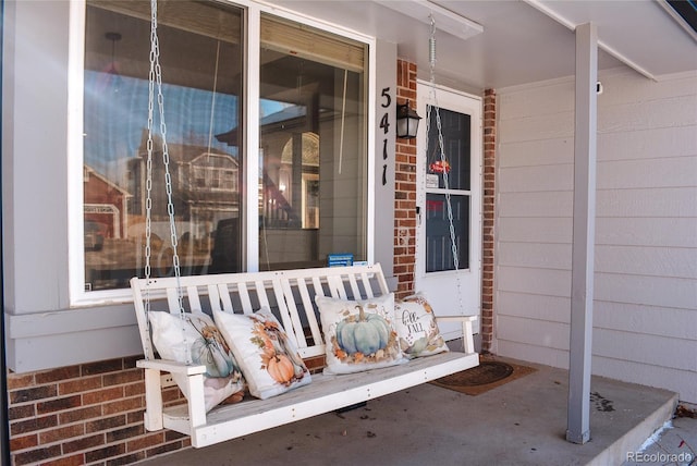 doorway to property with a porch