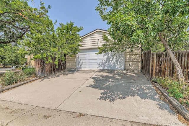 garage with fence