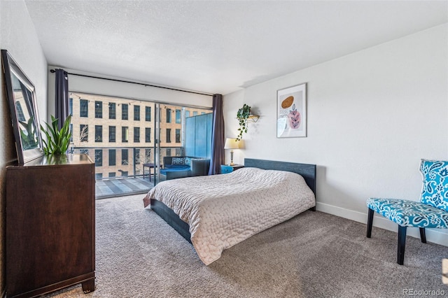 carpeted bedroom with baseboards