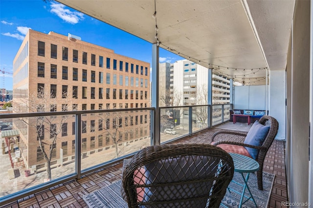 888 N Logan St Unit 5A, Denver, CO 80203 - balcony featuring a view of city